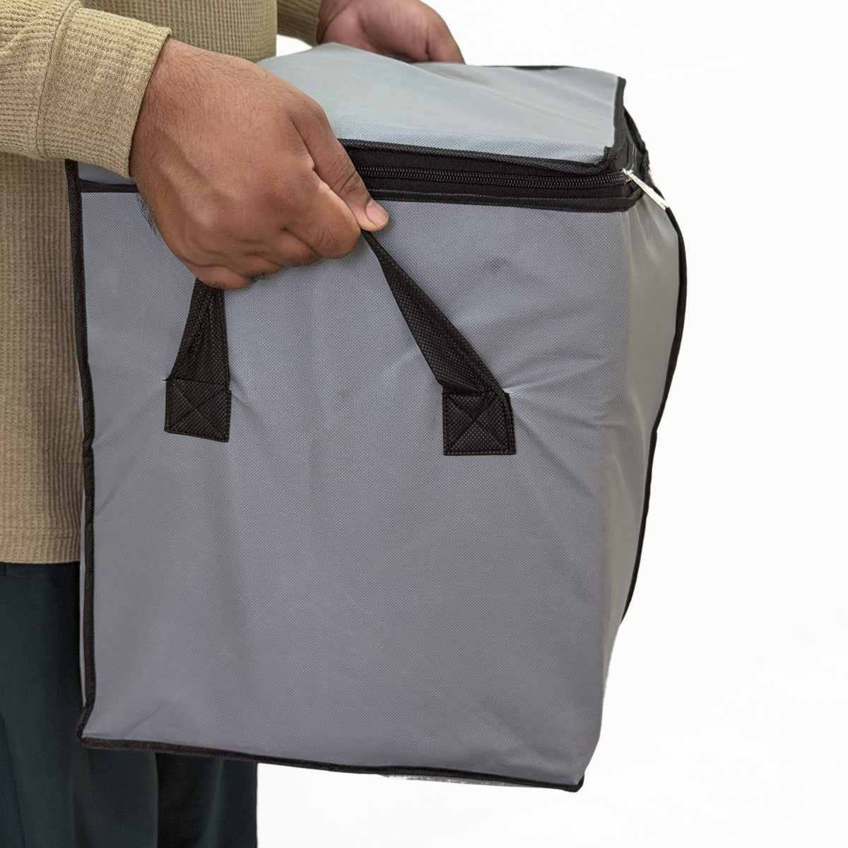 Full bag carried by its side handle